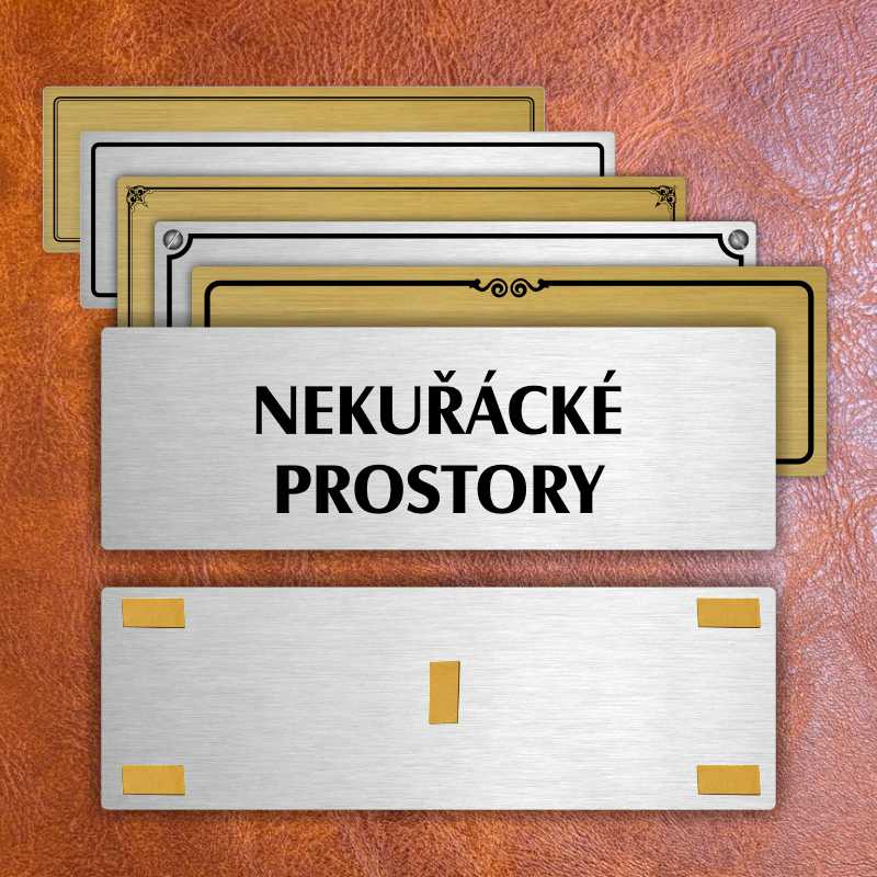 Nekuřácké prostory, 240x79mm, stříbrná popiska s ozdobou uprostřed