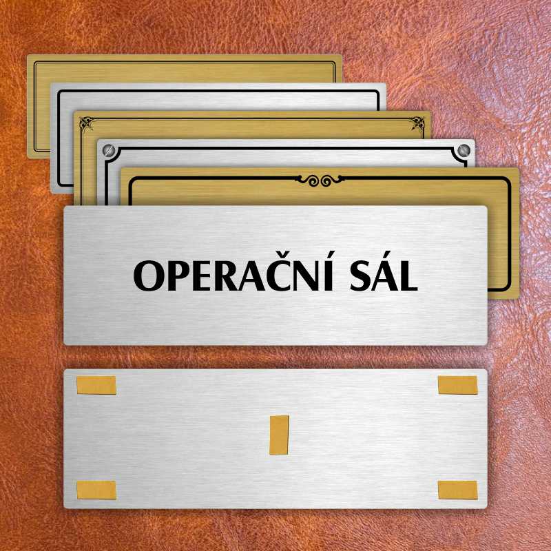 Operační sál, 240x79mm, stříbrná popiska s ozdobou uprostřed