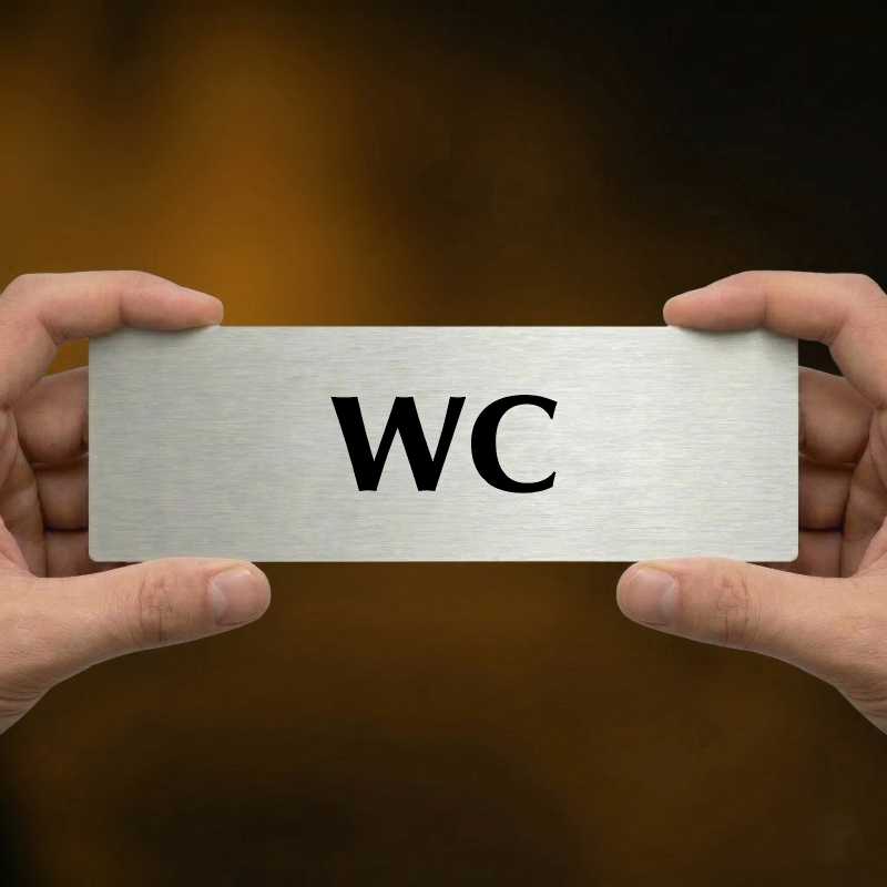 WC, 240x79mm, zlatá popiska s imitacemi šroubků