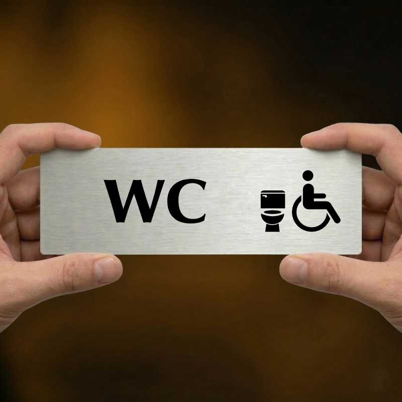 WC invalida, 240x79mm, stříbrná popiska s okrasným rámečkem