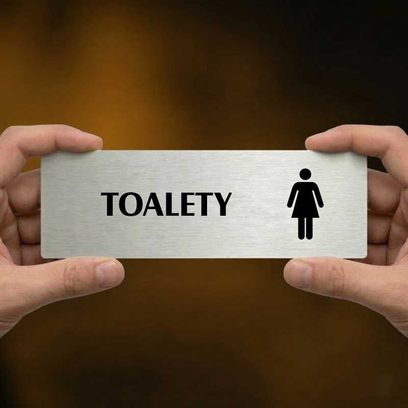 Toalety ženy, 200x66mm, zlatá popiska s rámečkem