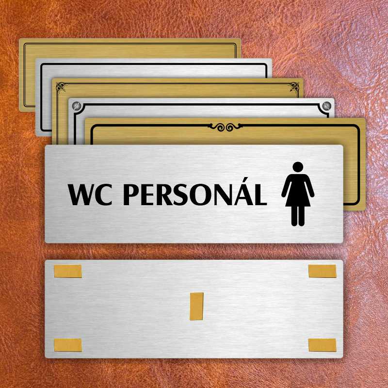 WC personál ženy, 240x79mm, stříbrná popiska s imitacemi šroubků