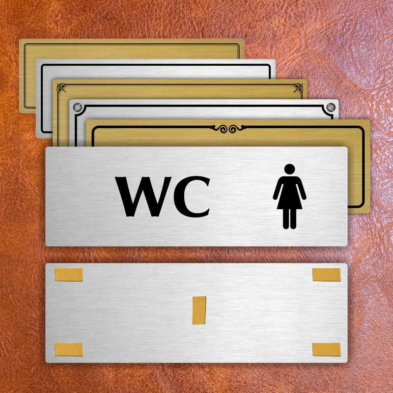 WC ženy, 240x79mm, stříbrná popiska s dvojtým rámečkem