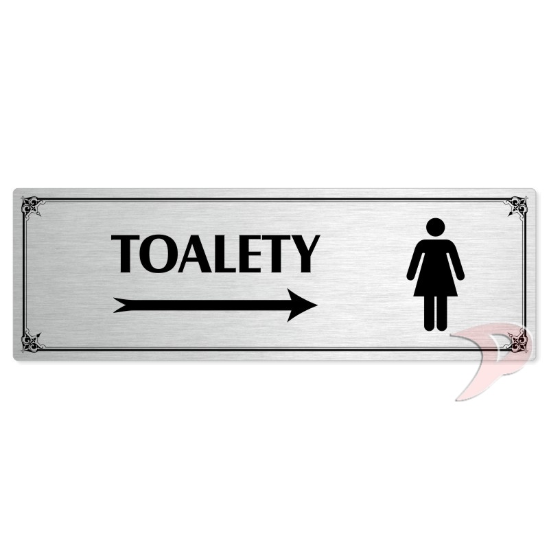 Toalety vpravo ženy, 240x79mm, stříbrná popiska s okrasným rámečkem