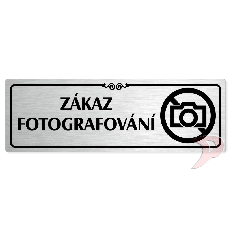 Zákaz fotografování, 200x66mm, stříbrná popiska s ozdobou uprostřed