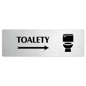 Toalety vpravo, stříbrná popiska na dveře