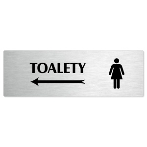 Toalety vlevo ženy, stříbrná popiska na dveře