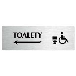 Toalety vlevo invalida, stříbrná popiska na dveře