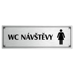 WC návštěvy ženy, 240x79mm, stříbrná popiska s okrasným rámečkem  