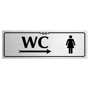 WC ženy vpravo, 240x79mm, stříbrná popiska s ozdobou uprostřed