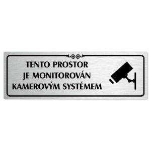 Kamera, 200x66mm, stříbrná popiska s ozdobou uprostřed