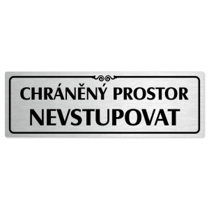 Chráněný prostor, 240x79mm, stříbrná popiska s ozdobou uprostřed
